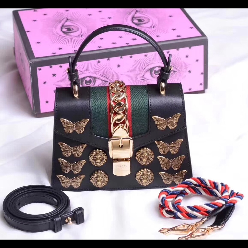 Women's leather handbag bow